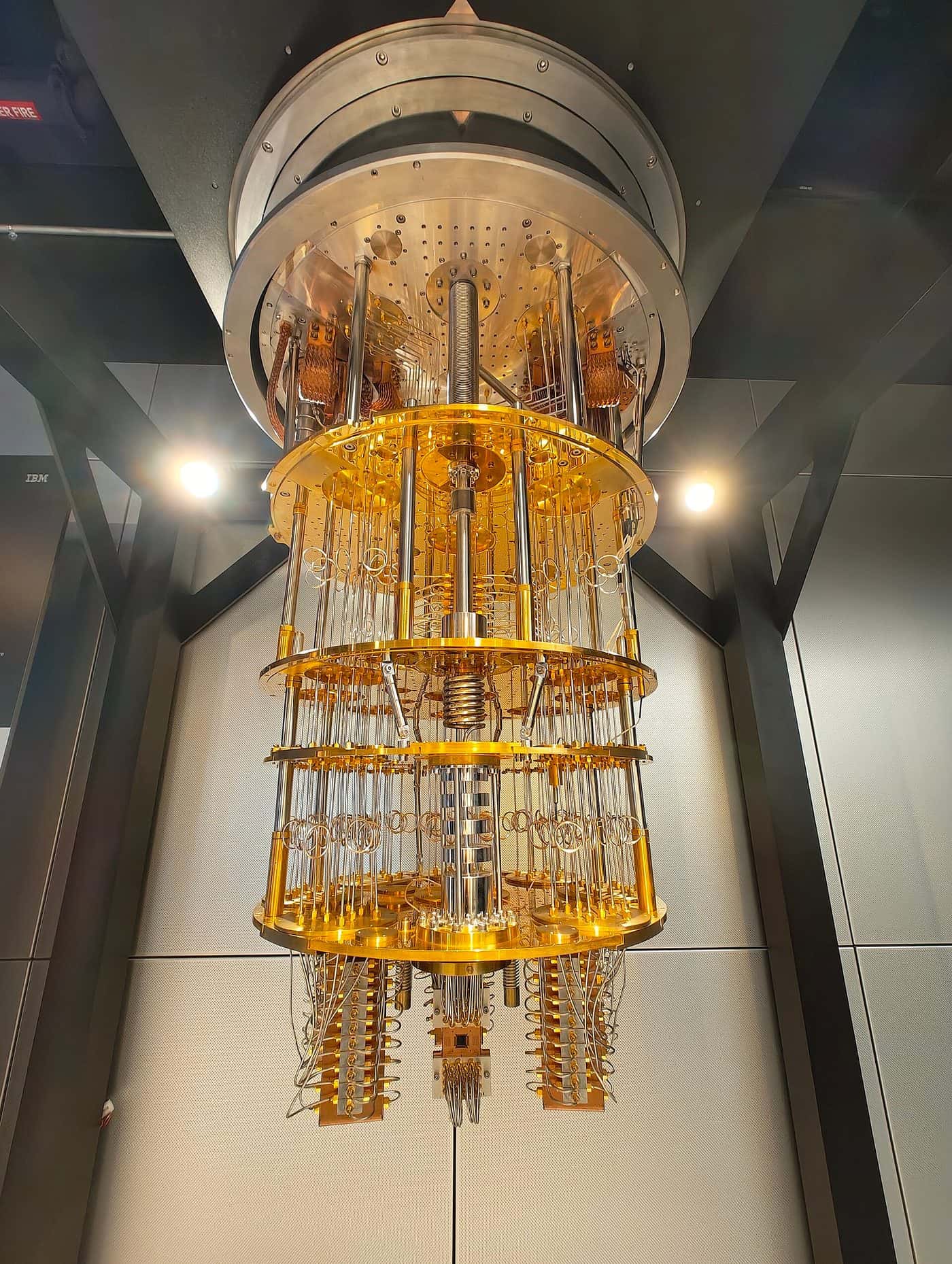 IBM Quantum System One hardware displayed in a glass enclosure